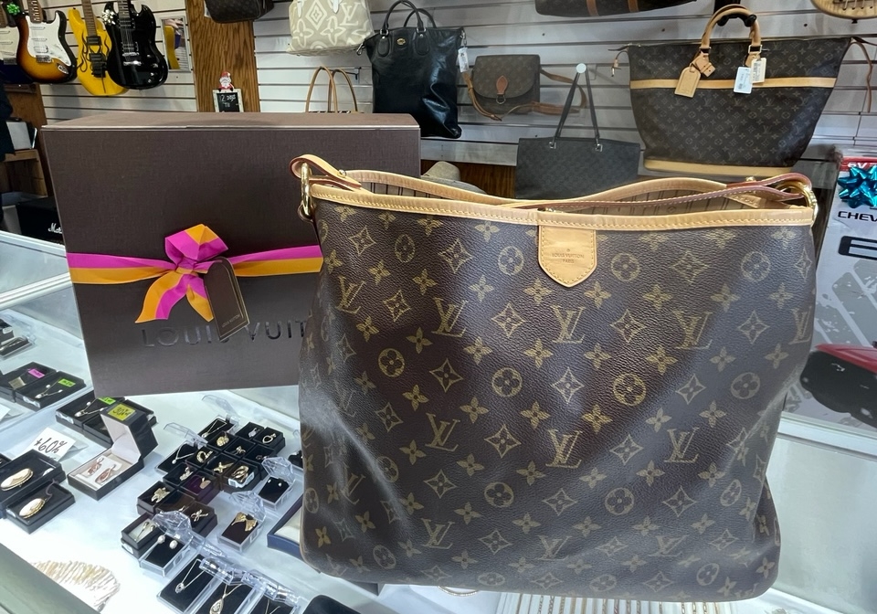 Chanel, Prada, Gucci, and Louis Vuitton Handbags Are Sold at a Bargain in  Pawn Shops